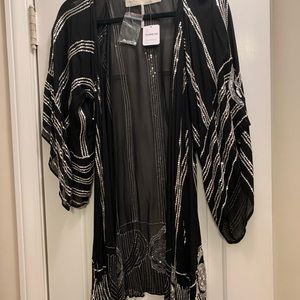 Jens pirate booty sold by free people. Black with sequin detail